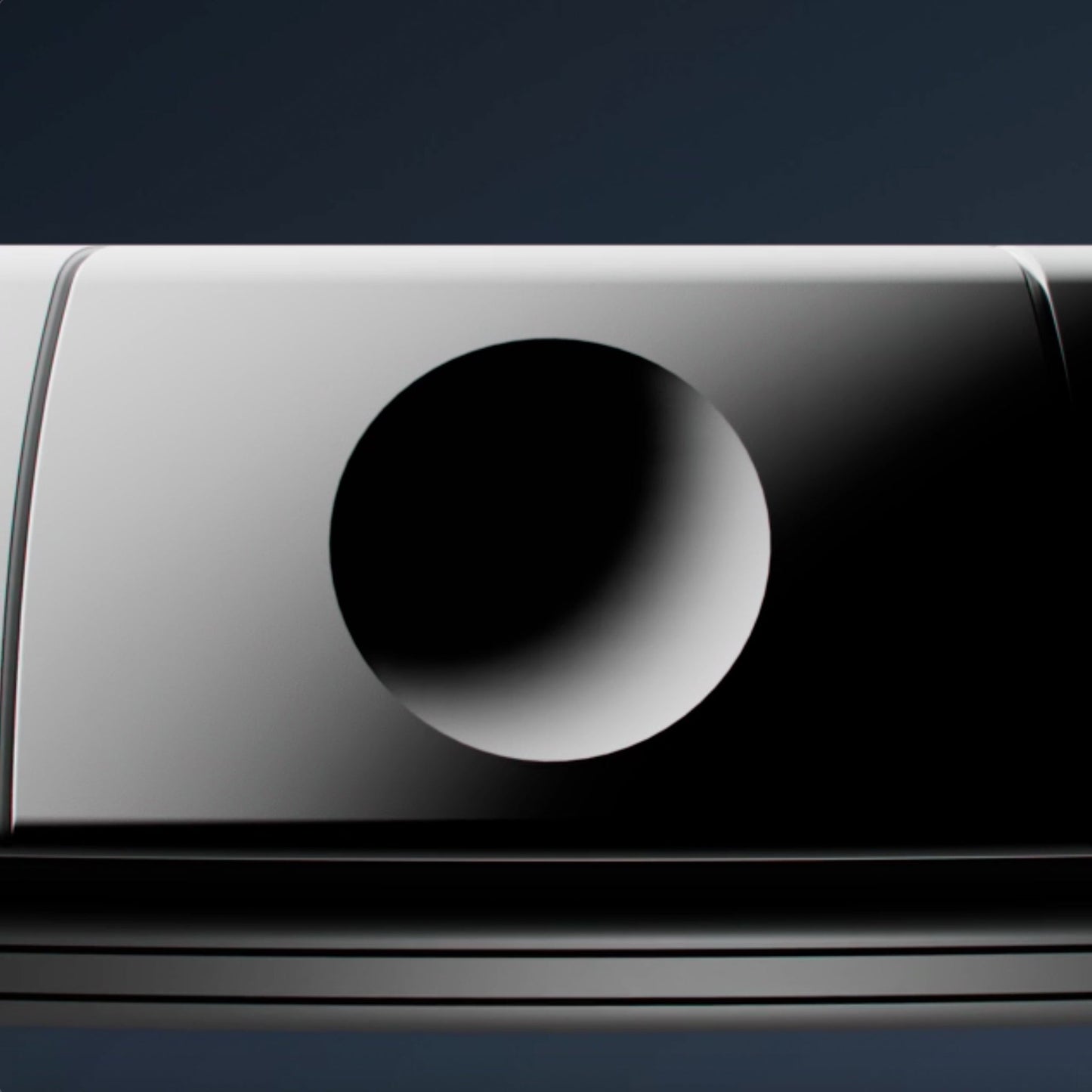 close up du bouton de controle de yobe light sur fond bleu nuit 