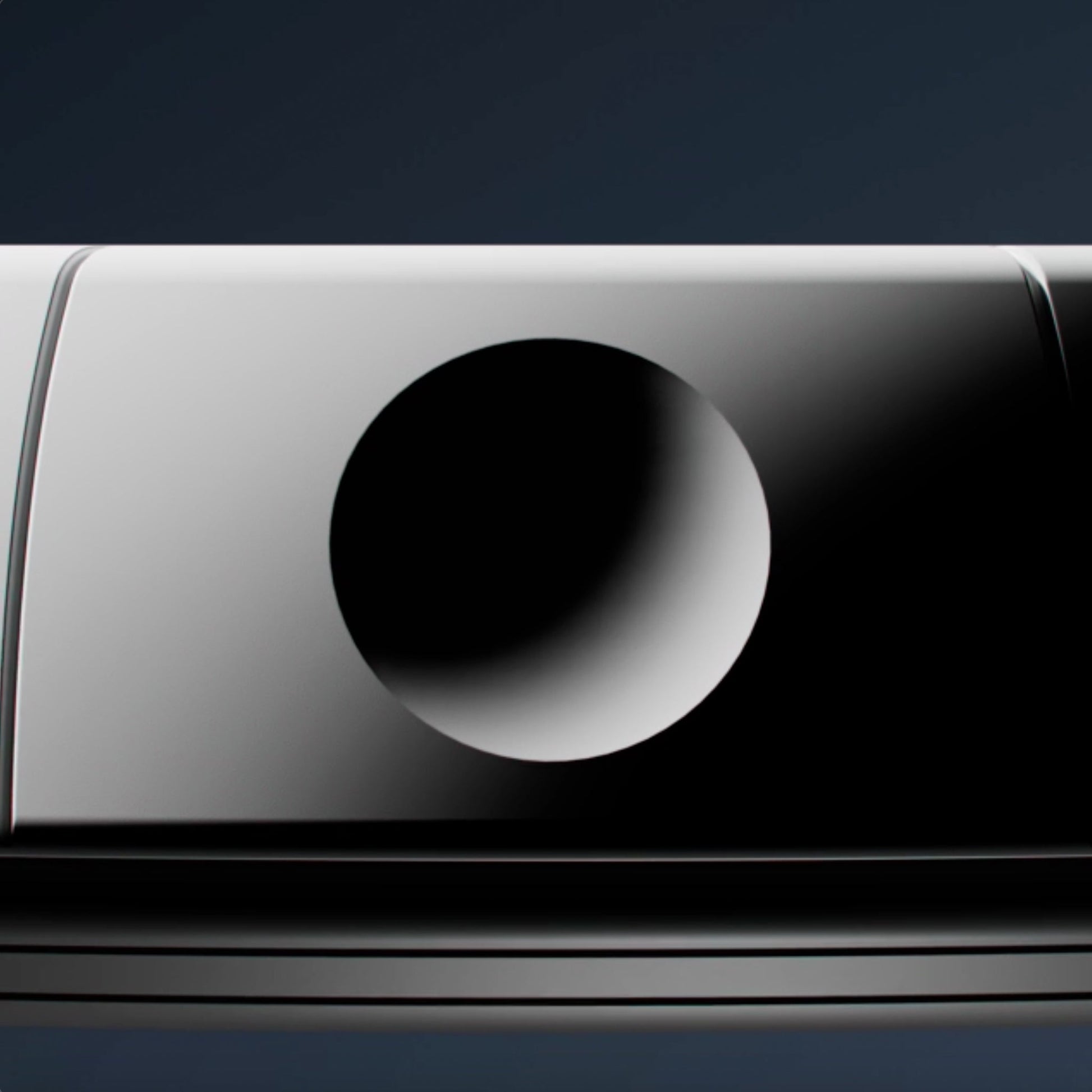 close up du bouton de controle de yobe light sur fond bleu nuit 